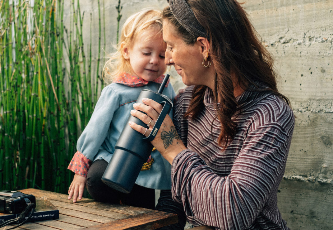 A mother and daughter using the MiiR All Day Straw Cup impact-timeline-hero-mobile.jpg__PID:37b0db60-29d5-4cc5-b451-7903a55d6d2b